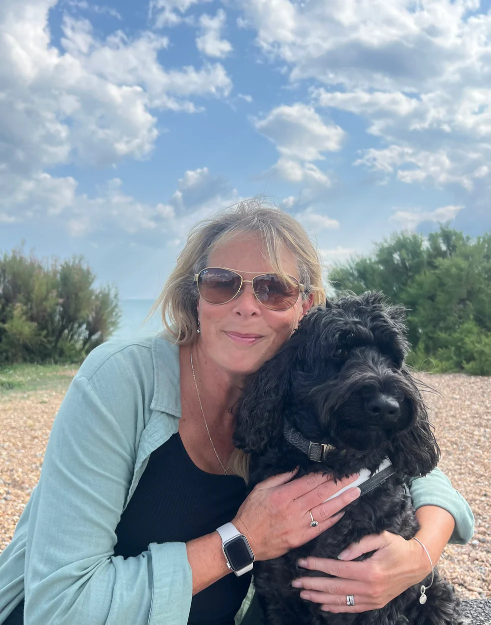 Sally, founder of Green Salt Designs, with her dog on the South Coast of England